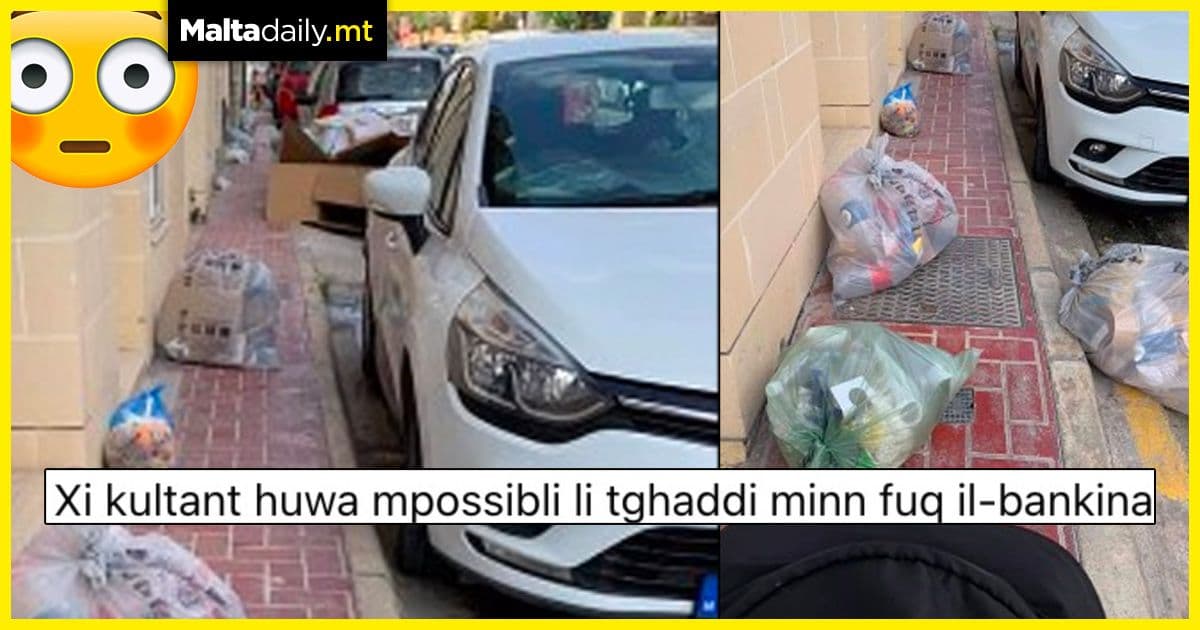 Walking on the pavement is sometimes impossible due to garbage bags