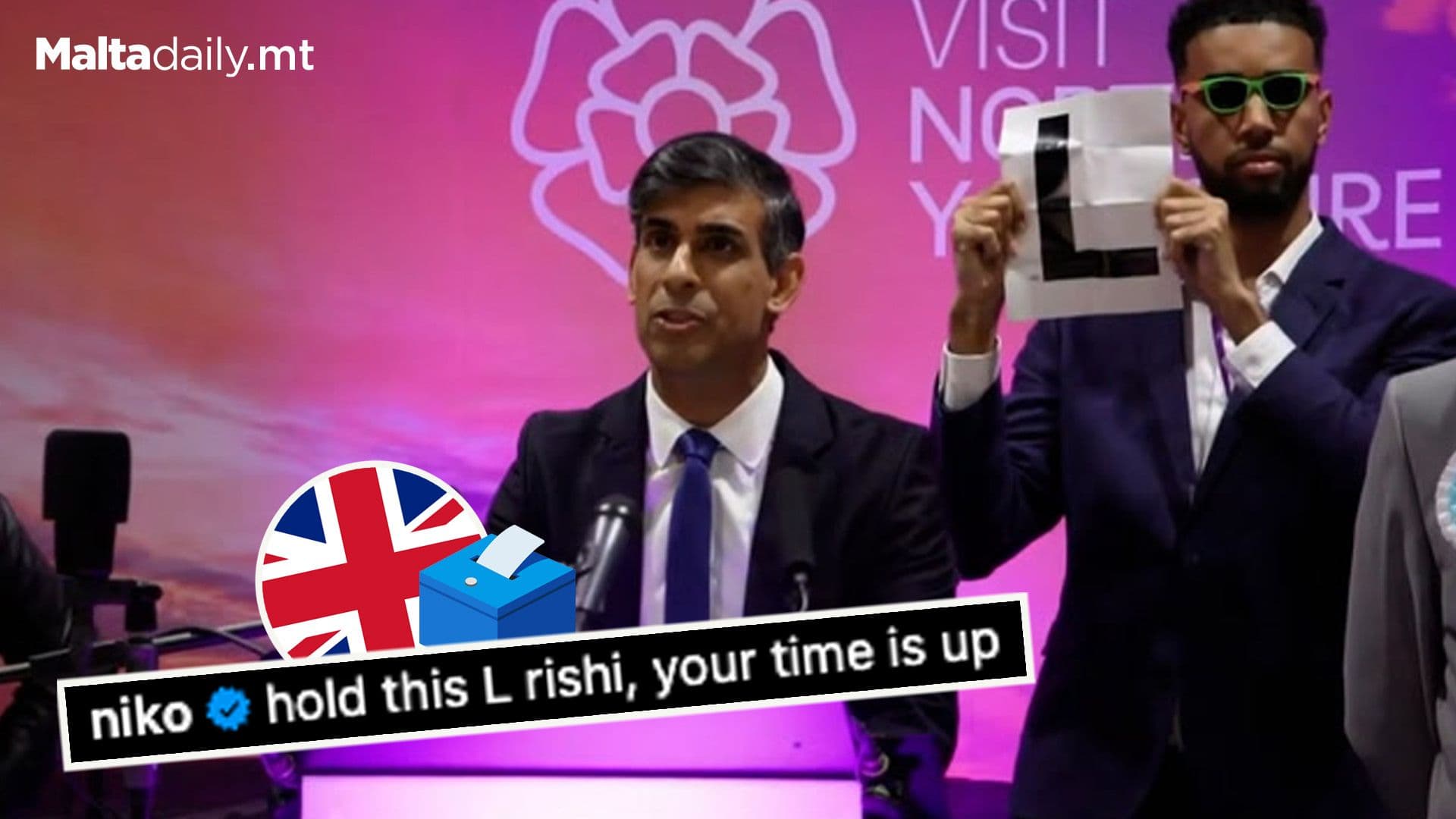 YouTuber Holds ‘L’ Behind Rishi Sunak For Losing Election