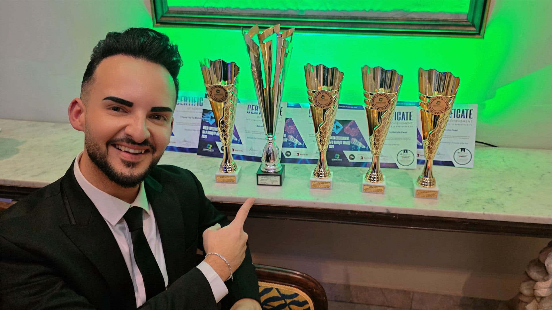 Malcolm Celebrates Award Wins And Receives International Recognition At The European International Music Awards