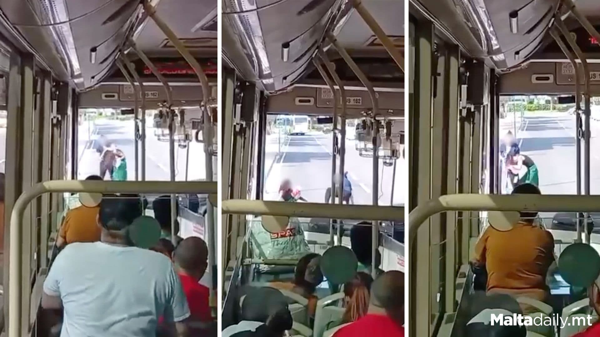 Two People Caught Fighting In Middle Of Road In Front Of Bus