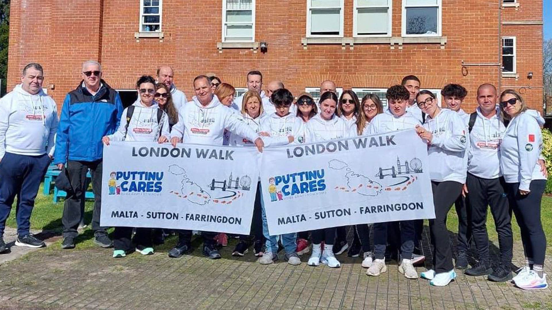VOLUNTEERS COMPLETE 14-MILE PUTTINU WALK IN LONDON