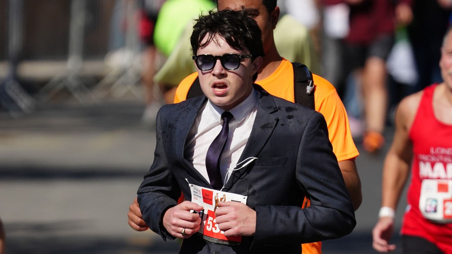 Local Photographer Snaps Marathon Runner Wearing Full Suit
