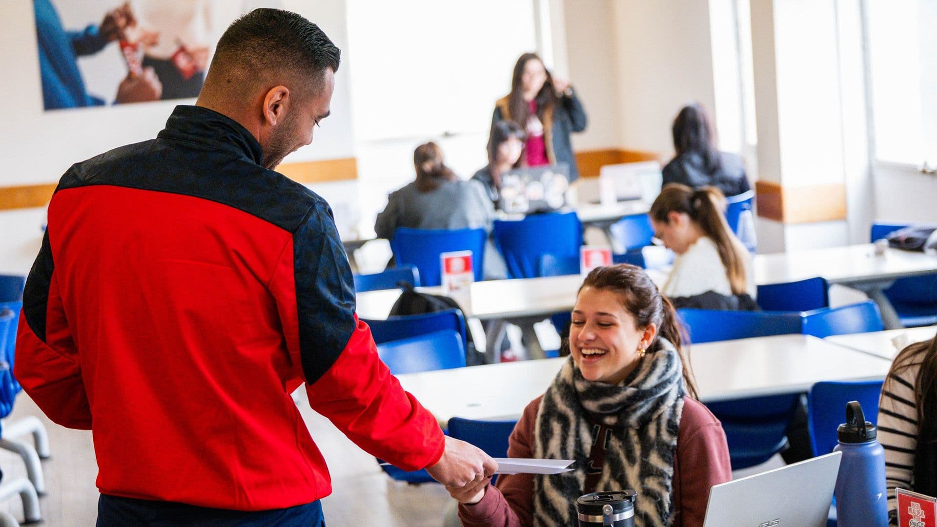 Malta National Team Players Hand Out Free Tickets at University of Malta