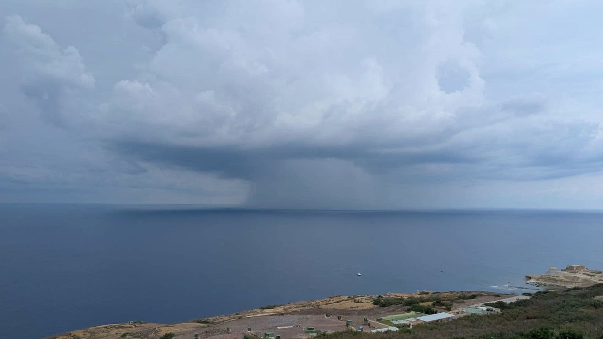 Stunning Rainy Cloud Formation Photographed Off Żebbug, Gozo Coast