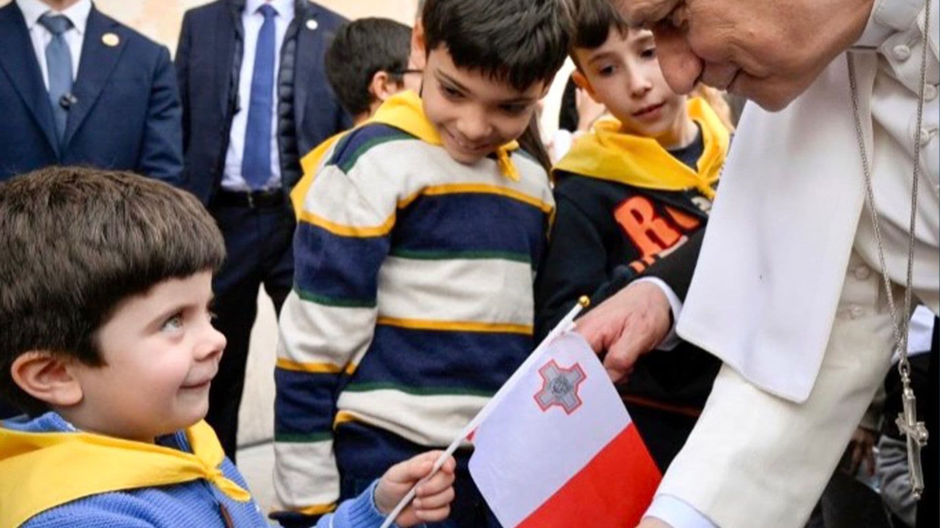 LITTLE BOY WAVES MALTESE FLAG AS HE MEETS POPE LEO XIV