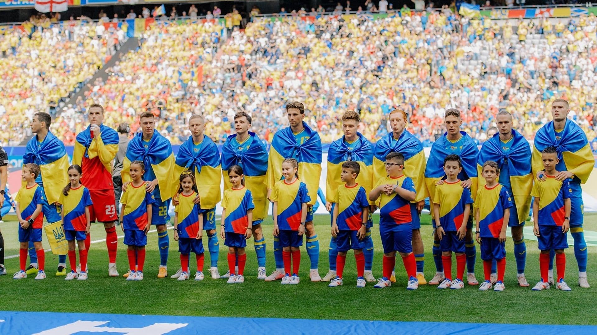 Why Ukraine Players Wear Flags Around Their Shoulders