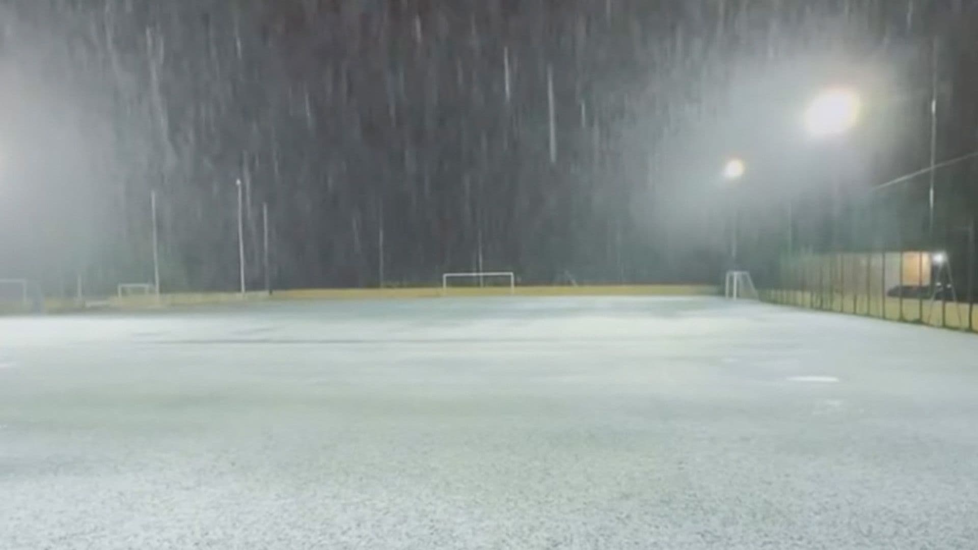 Local Pitch Turns White in Fierce Hailstorm