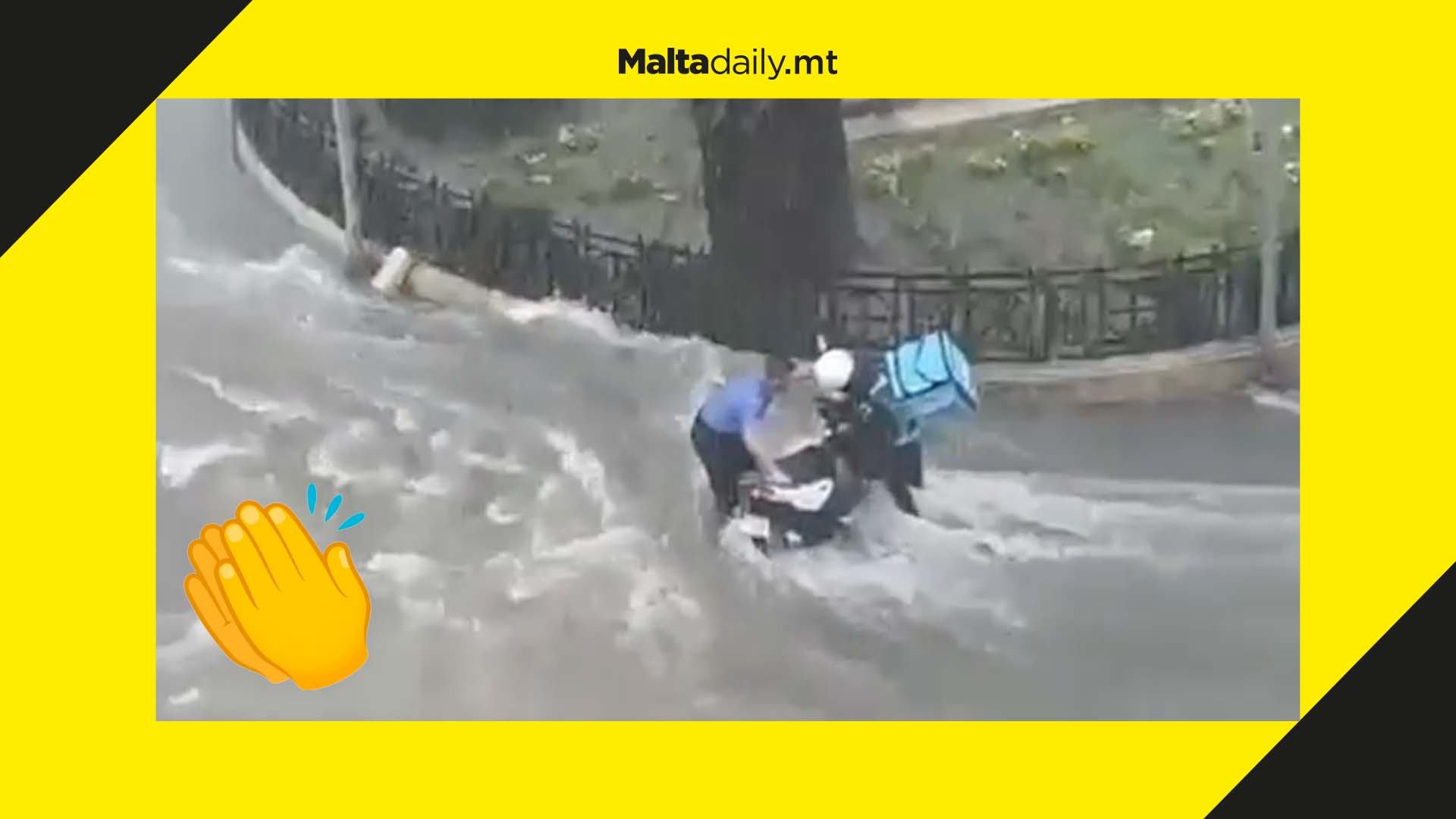 WATCH: Police man helps food delivery driver in flooding road