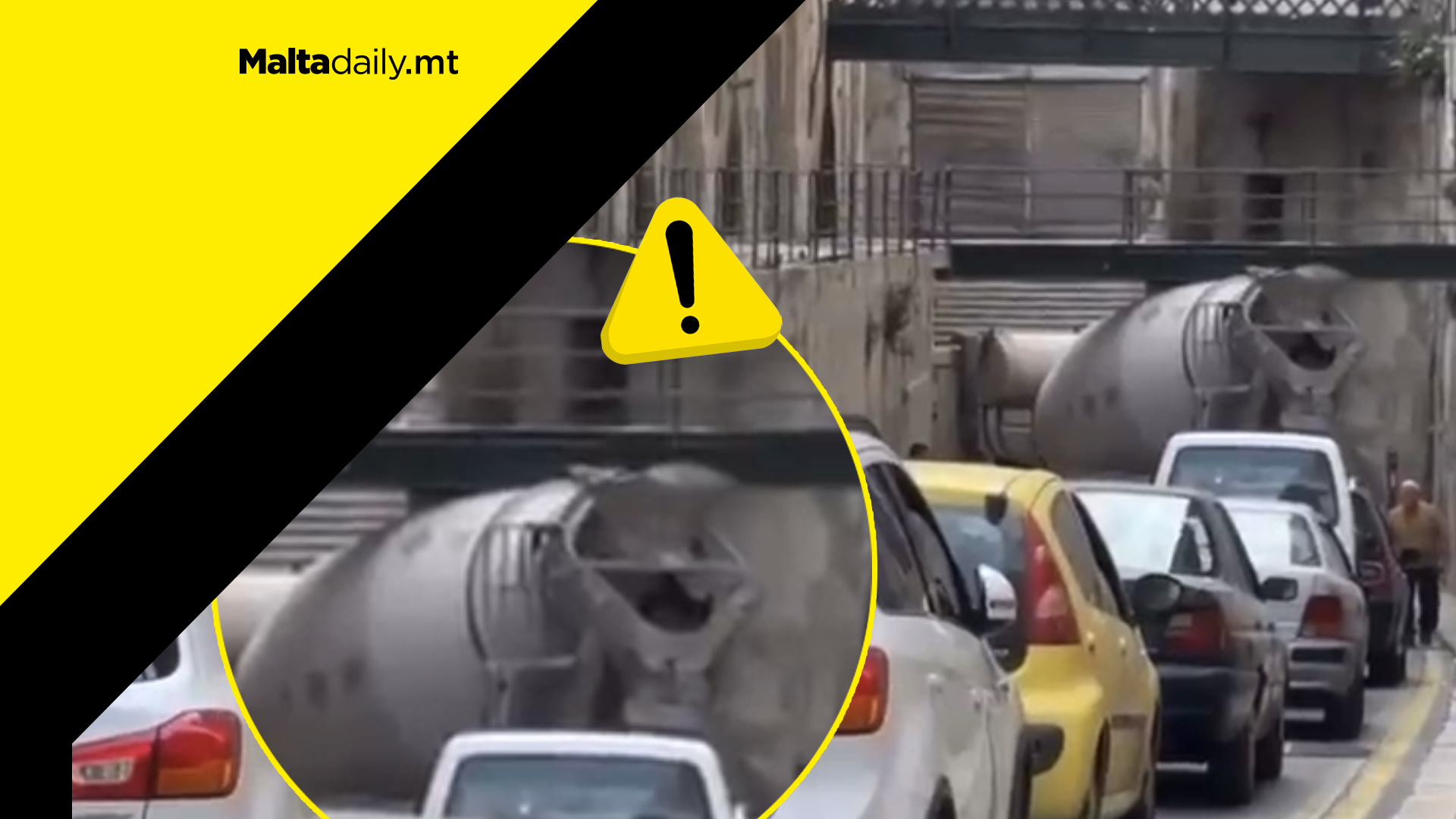 Cement mixing truck gets stuck under a low bridge in Valletta