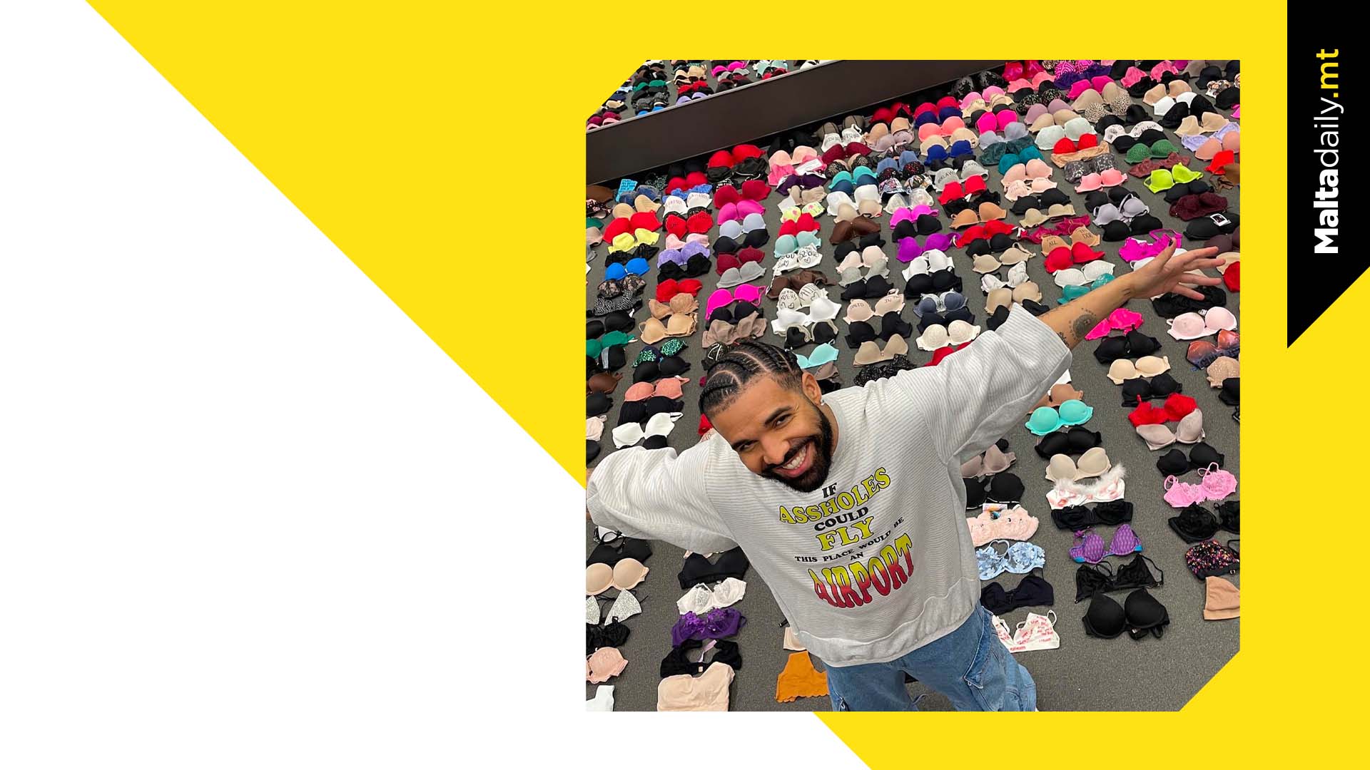 Drake Poses With Collection Of Bras Thrown At Him During Concerts