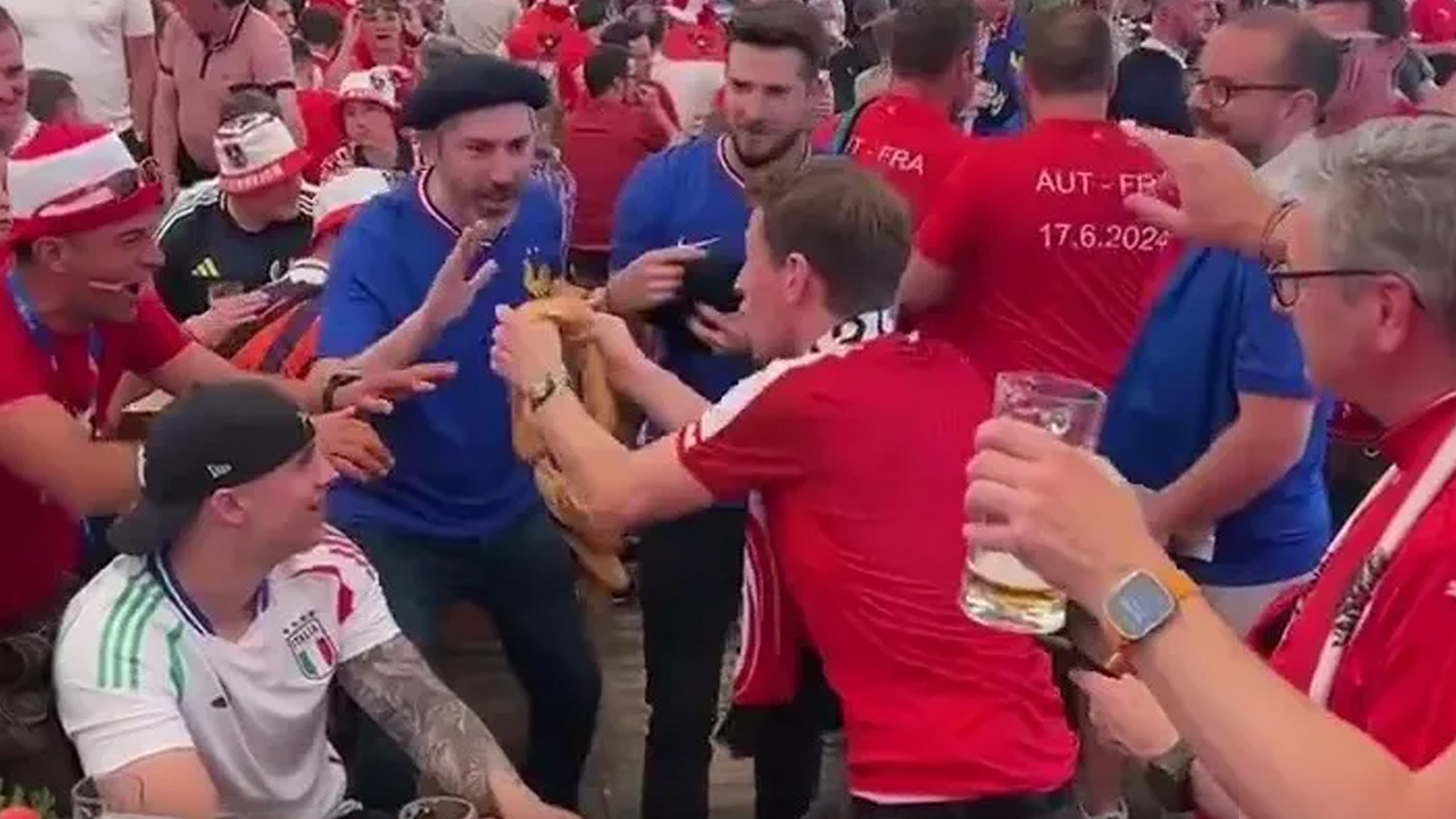 Austrian Fan Snaps Baguette to Taunt French Supporters