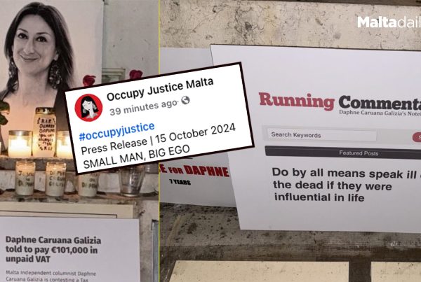 Occupy Justice Slam Neville Gafa Placing Placards On Galizia Memorial